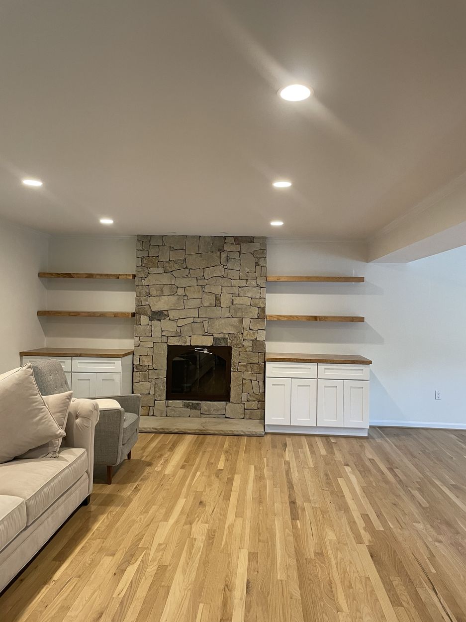 Stone fireplace living room with fresh interior paint in Northern Virginia